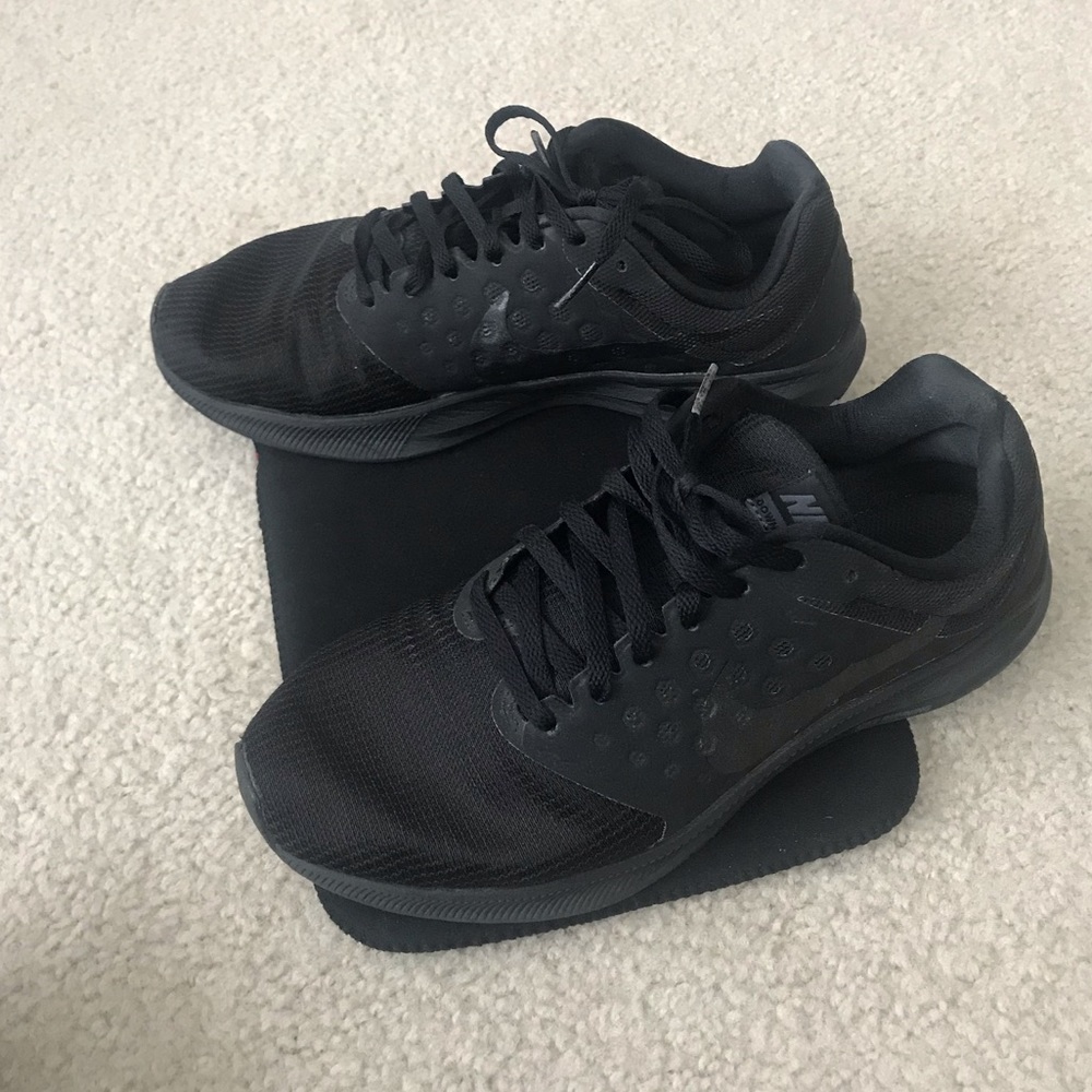 Black Nike Running shoe, women’s size 8.